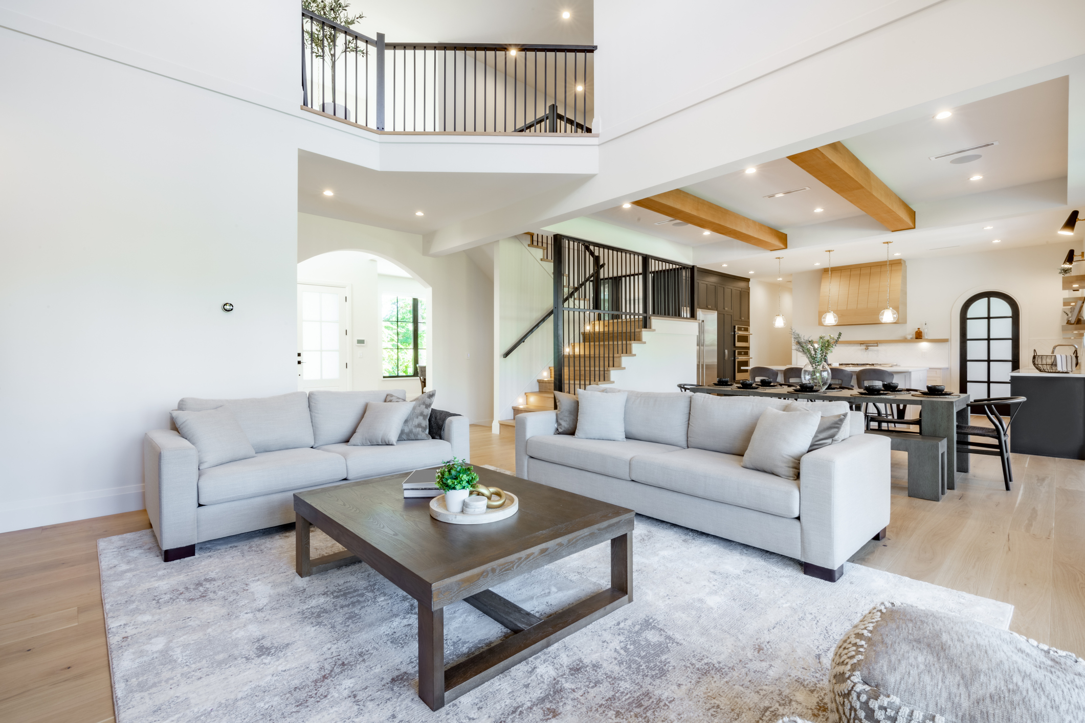 Grand two-story living room with open floor plan