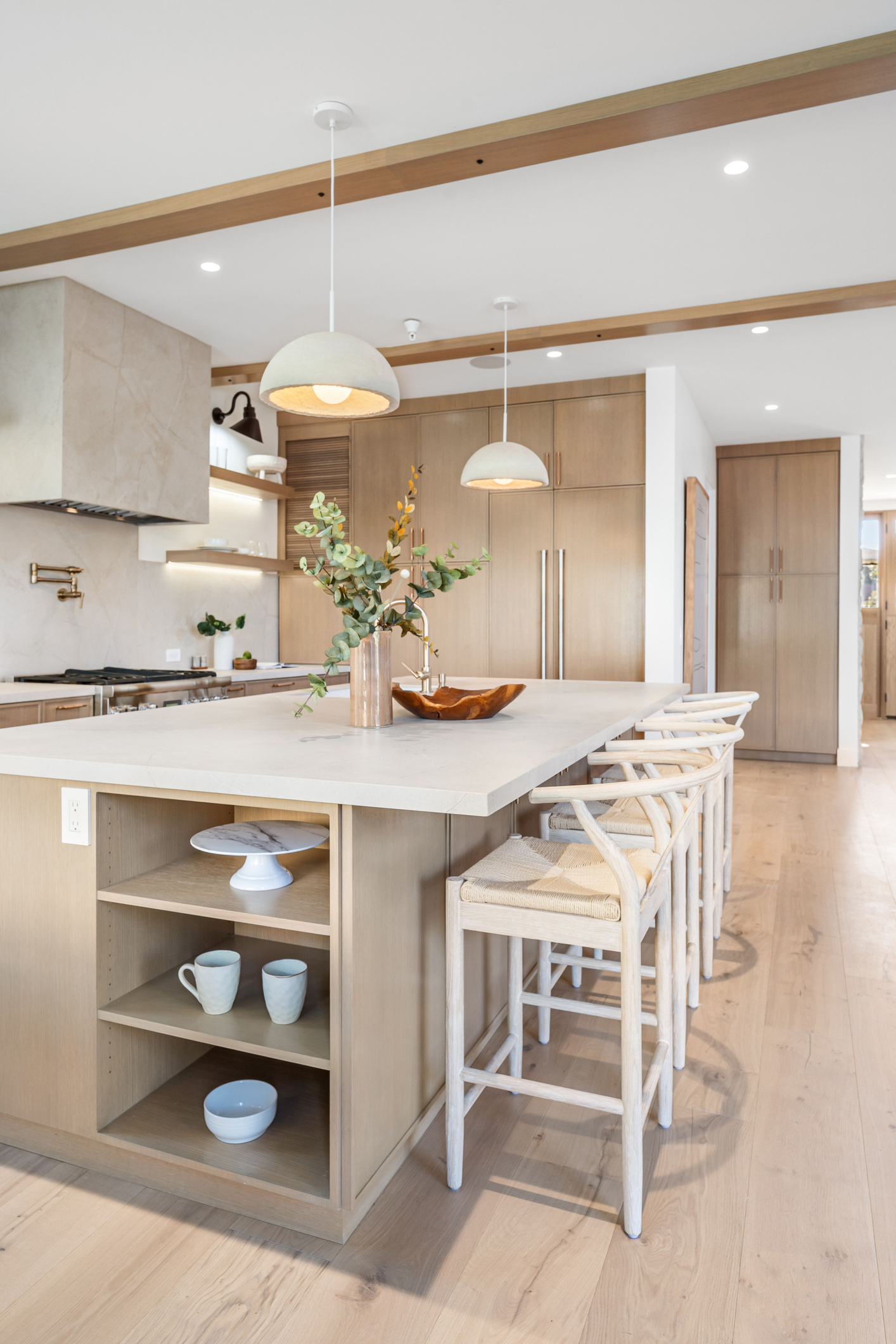 Natural wood kitchen with island seating